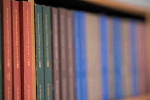 Editions of the Brookings Papers on Economic Activity are pictured