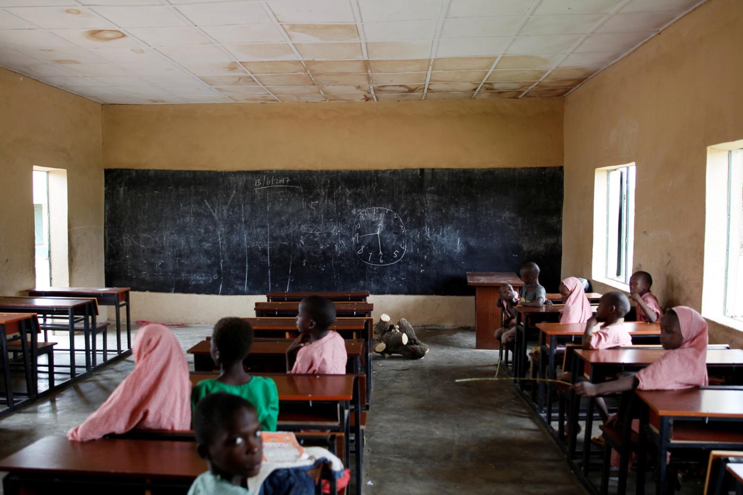 Pupils sit in a classroom at the Hausari primary school in Michika village, northeast Nigeria June 12, 2017. Picture taken June 12, 2017. REUTERS/Akintunde Akinleye - RC1608963540