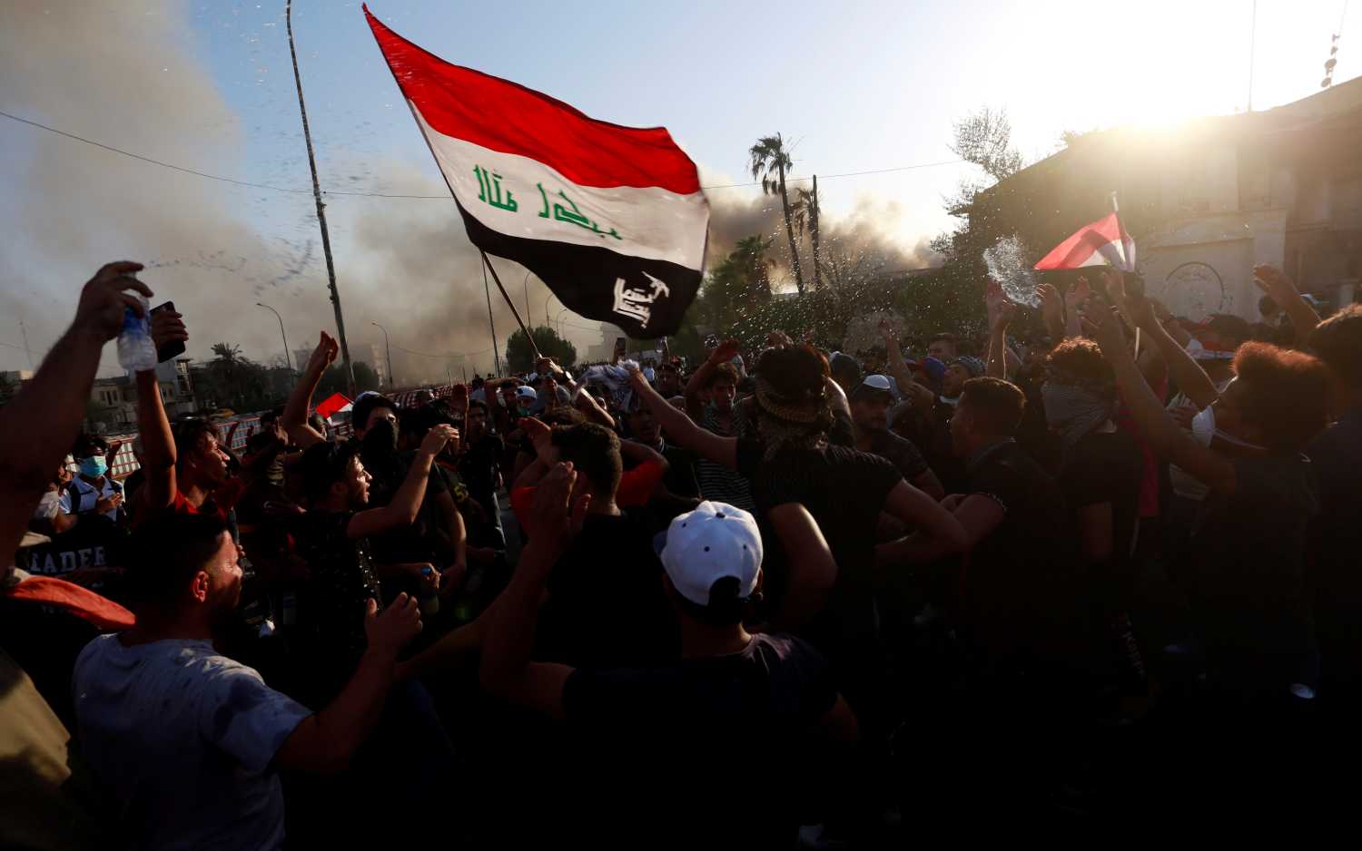 People gather during a protest near the building of the government office in Basra, Iraq September 6, 2018. REUTERS/Alaa al-Marjani
