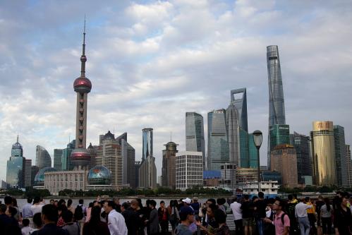 People visit the Bund in front of Shanghai's financial district of Pudong in Shanghai, China September 28, 2017. REUTERS/Aly Song - RC16F32D9FA0