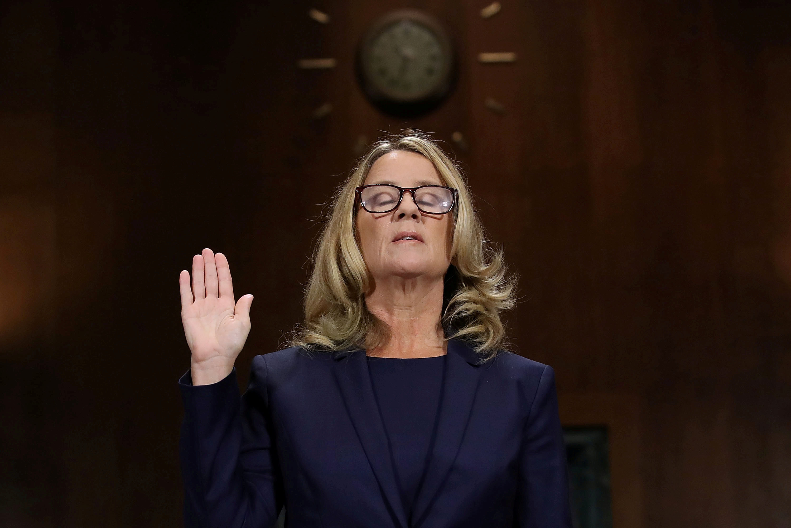 Christine Blasey Ford is sworn in before testifying the Senate Judiciary Committee in the Dirksen Senate Office Building at the Capitol Hill in Washington, DC, U.S., September 27, 2018. Win McNamee/Pool via REUTERS      TPX IMAGES OF THE DAY - RC1F30B69AF0