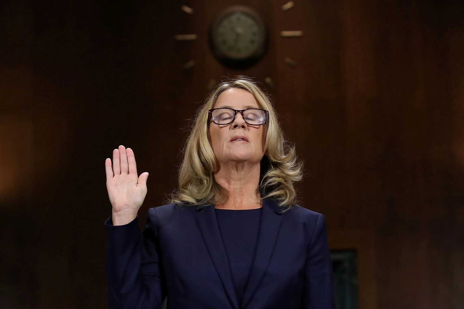 Christine Blasey Ford is sworn in before testifying the Senate Judiciary Committee in the Dirksen Senate Office Building at the Capitol Hill in Washington, DC, U.S., September 27, 2018. Win McNamee/Pool via REUTERS      TPX IMAGES OF THE DAY - RC1F30B69AF0