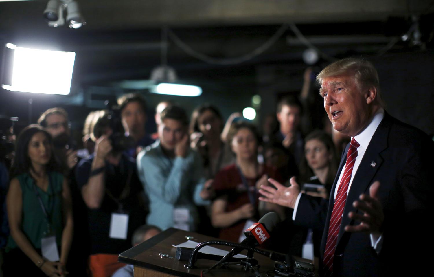 U.S. Republican presidential candidate Donald Trump speaks at a news conference.
