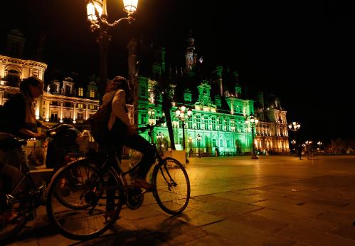 Green lights are projected onto the facade of the Hotel de Ville in Paris, France, after U.S. President Donald Trump announced his decision that the United States will withdraw from the Paris Climate Agreement at a news conference  June 1, 2017. REUTERS/Philippe Wojazer - UP1ED611NP15U