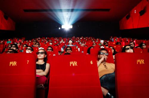 Cinema-goers wearing 3D glasses watch a movie at a PVR Multiplex in Mumbai November 10, 2013. Multiplex operators like PVR Ltd, Inox Leisure, Reliance Mediaworks and Mexican chain Cinepolis are scrambling to set up theatres targeting the rapidly growing number of middle-class Indians willing to pay to watch Bollywood movies in more comfortable surroundings. The potential is huge, provided operators can find the right location in a country where prime urban real estate is costly and in short supply. Picture taken November 10, 2013.       To match MULTIPLEX-INDIA/        REUTERS/Danish Siddiqui (INDIA - Tags: SOCIETY BUSINESS ENTERTAINMENT) - GM1E9BK0DED01