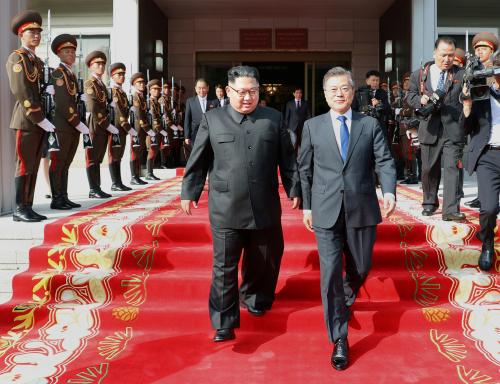 South Korean President Moon Jae-in and North Korean leader Kim Jong Un leave after their summit at the truce village of Panmunjom, North Korea, in this handout picture provided by the Presidential Blue House on May 26, 2018. Picture taken on May 26, 2018. The Presidential Blue House /Handout via REUTERS