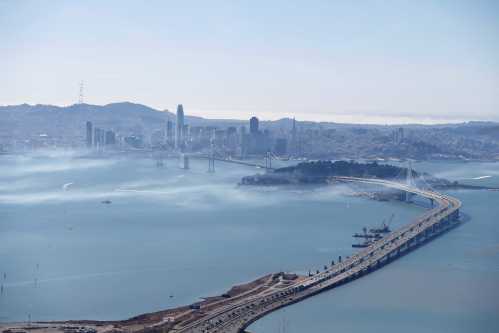 The San Francisco-Oakland Bay Bridge and San Francisco is seen in Oakland, California, U.S., October 5, 2017. REUTERS/Stephen Lam - RC1DA66B75D0