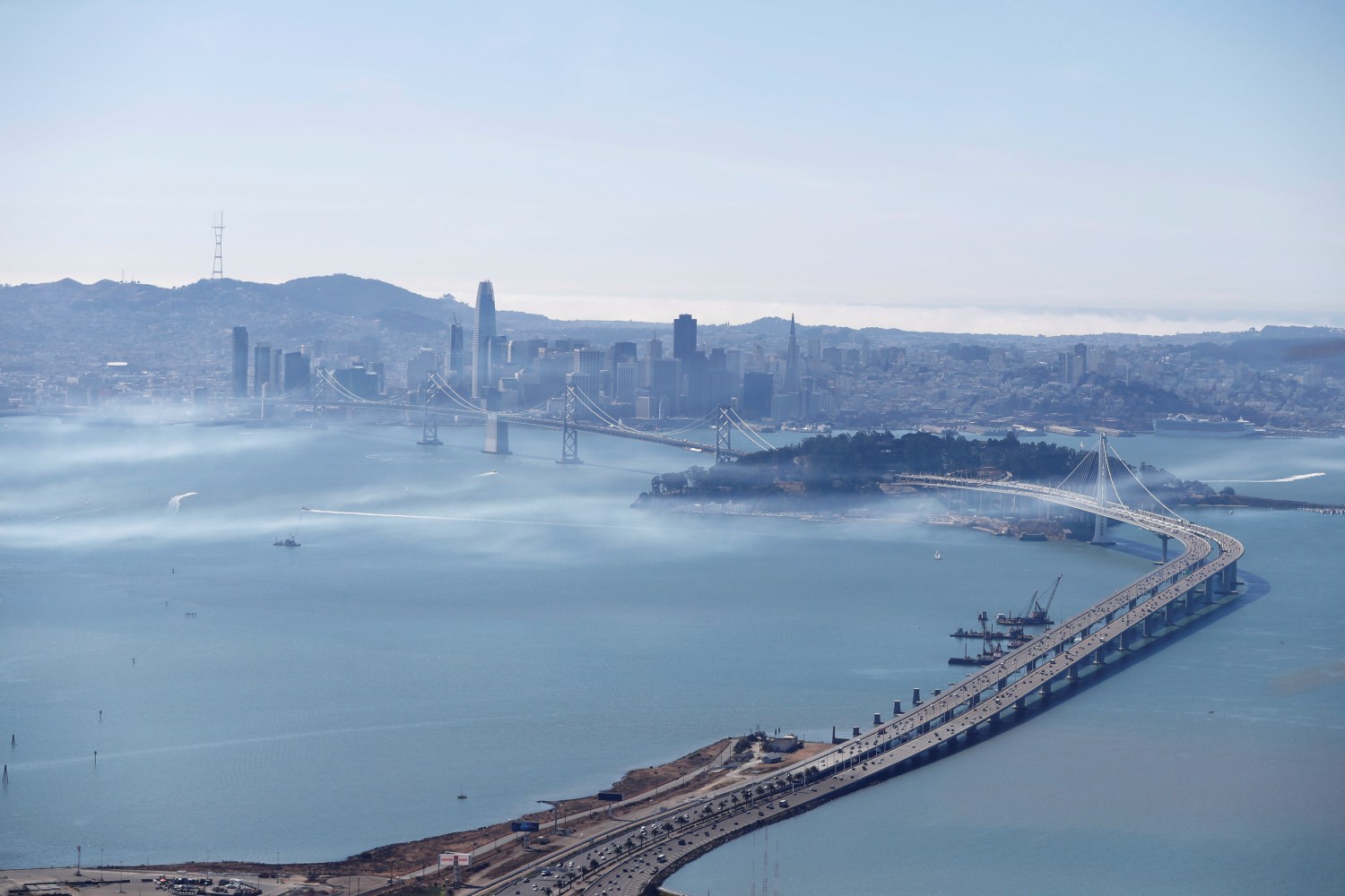The San Francisco-Oakland Bay Bridge and San Francisco is seen in Oakland, California, U.S., October 5, 2017. REUTERS/Stephen Lam - RC1DA66B75D0