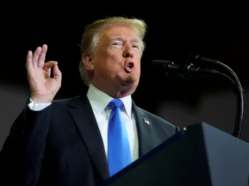 U.S. President Donald Trump speaks during a Make America Great Again rally in Richmond, Kentucky, U.S., October 13, 2018.      REUTERS/Joshua Roberts - RC1F026013D0