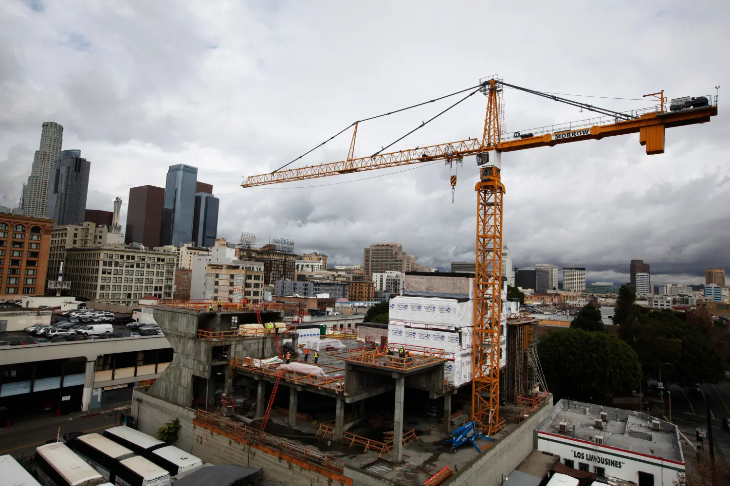 Skid Row Housing Trust's 102 pre-fabricated 350 square foot modular apartments are seen under construction downtown, becoming the first housing complex of its type for the homeless in the nation, in Los Angeles, California, December 18, 2012. REUTERS/Lucy Nicholson (UNITED STATES - Tags: BUSINESS CONSTRUCTION SOCIETY REAL ESTATE) - GM1E8CJ0EQO01