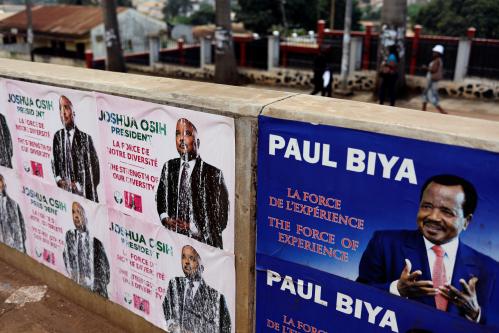 Electoral Placards of Cameroon President Paul Biya, who runs for reelection scheduled for October 7, and candidate Joshua Osih of Social Democratic Front party are pictured in Yaounde, Cameroon October 5, 2018. REUTERS/Zohra Bensemra - RC147B6F58C0