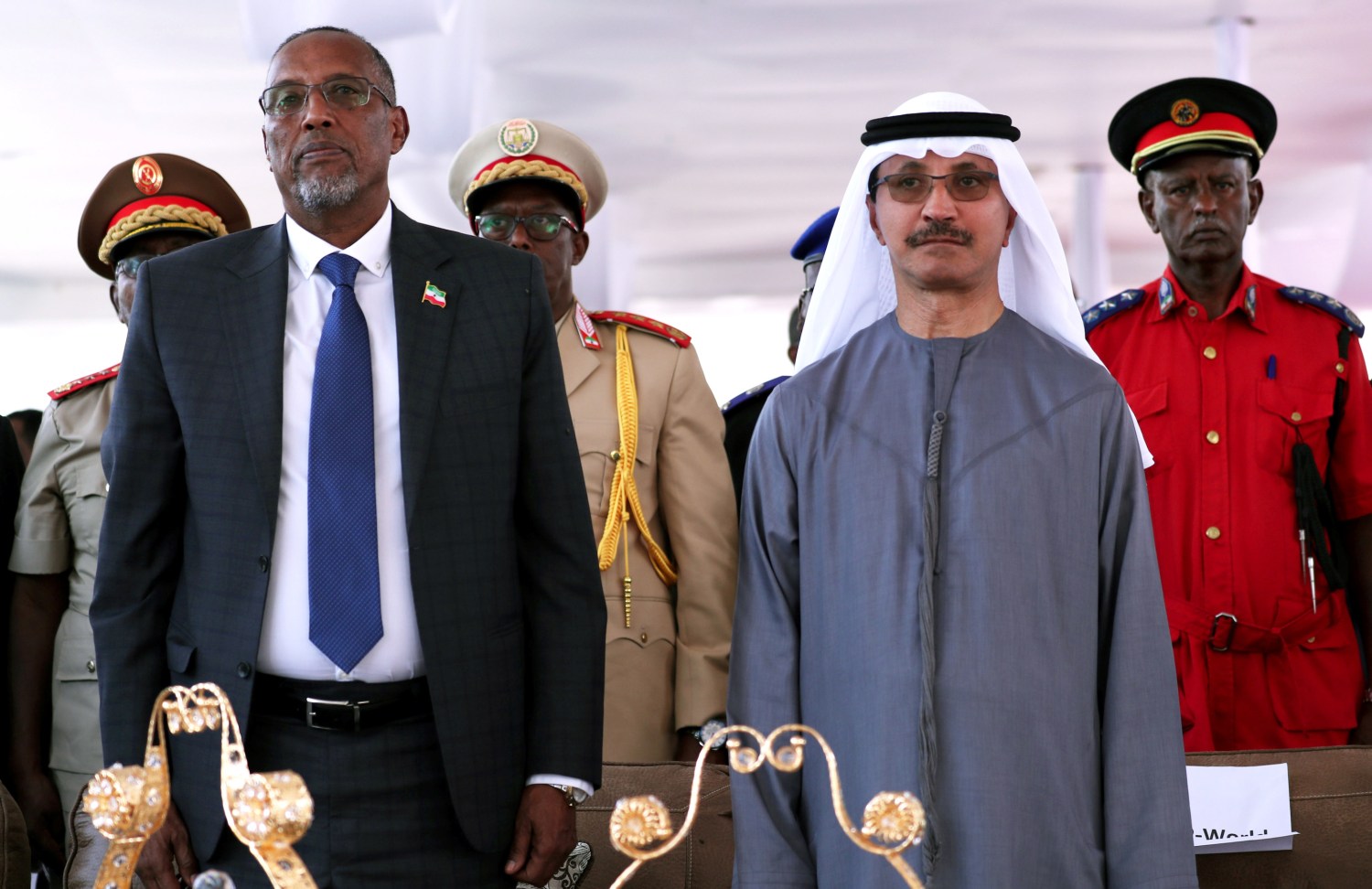 Muse Bihi Abdi, of Somaliland and Sultan Ahmed bin Sulayem, Chairman and Chief Executive Officer of DP World, attend the signing ceremony of expansion project of Berbera port in Hargeysa, in northern Somalia's semi-autonomous Somaliland region, October 11, 2018. Picture taken October 11, 2018. REUTERS/Tiksa Negeri - RC1DA84468C0