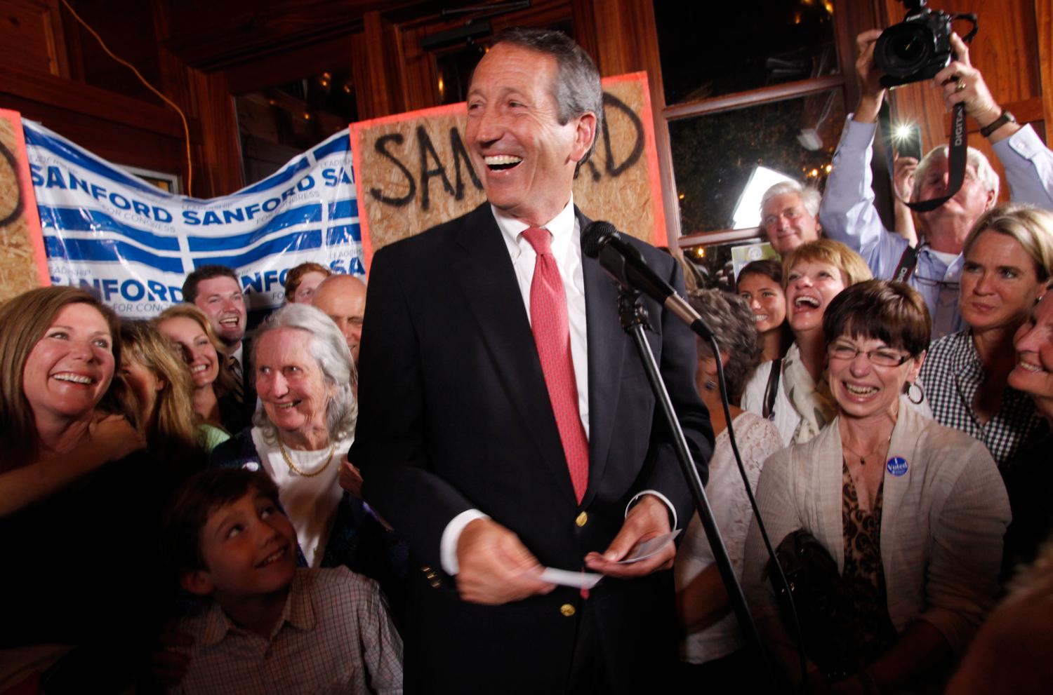 Former South Carolina Governor Mark Sanford celebrates his victory with a large crowd in the South Carolina first district congressional race at Liberty Tap Room in Mount Pleasant, South Carolina May 7, 2013. Republican former Governor Sanford made a political comeback on Tuesday, rebounding from a sex scandal to beat Democrat Elizabeth Colbert Busch in a congressional race to represent coastal South Carolina. REUTERS/Randall Hill  (UNITED STATES - Tags: POLITICS ELECTIONS TPX IMAGES OF THE DAY) - GM1E9580T3T01