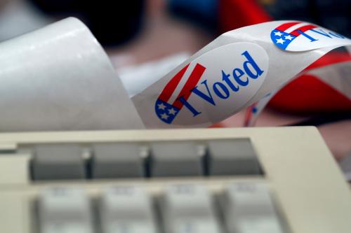 A "I Voted" sticker is shown by a keyboard in the Voting Machine Hacking Village during the Def Con hacker convention in Las Vegas, Nevada, U.S. on July 29, 2017. REUTERS/Steve Marcus - RC118719DD00