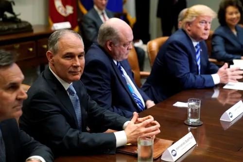 Environmental Protection Agency (EPA) Administrator Scott Pruitt (2nd L) attends as U.S. President Donald Trump meets with chief executives of major U.S. and foreign automakers at the White House in Washington, U.S. May 11, 2018.  REUTERS/Jonathan Ernst - RC1392DC3040