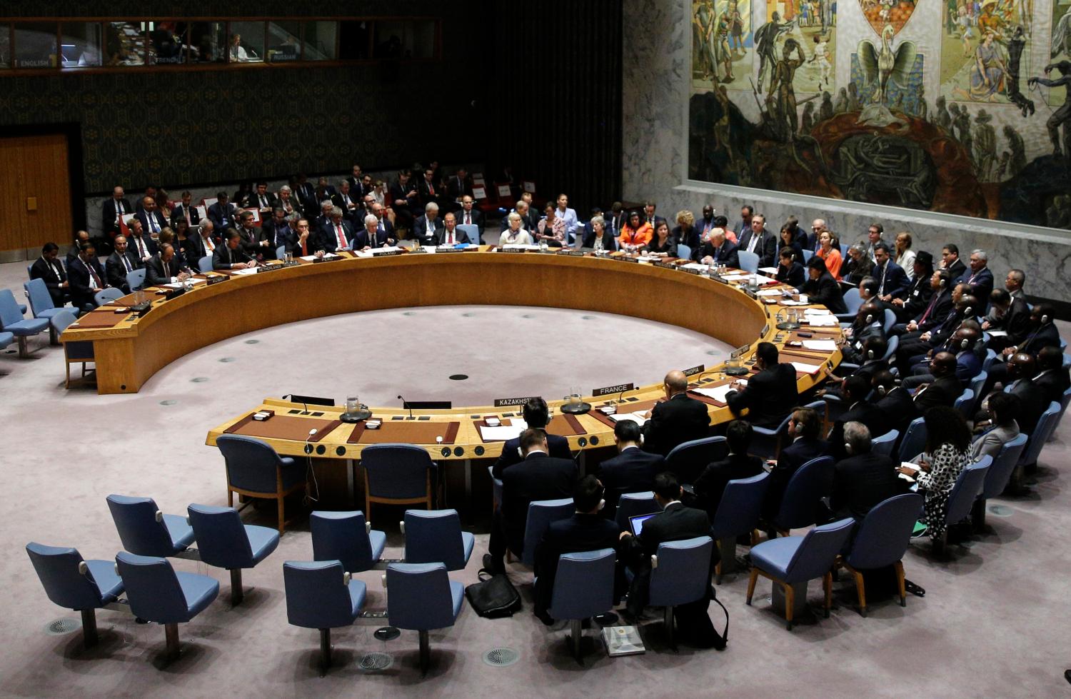 U.S. President Donald Trump (R, center) chairs a meeting of the United Nations Security Council held during the 73rd session of the United Nations General Assembly at U.N. headquarters in New York, U.S., September 26, 2018. REUTERS/Eduardo Munoz - HP1EE9Q17F7D4