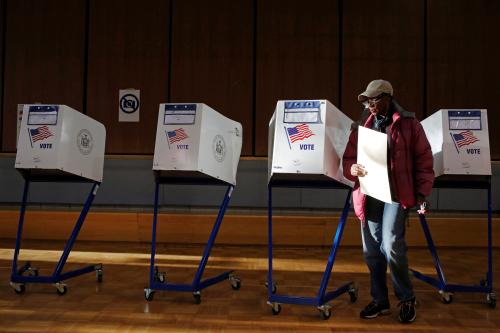 A woman exits the voting booth after filling out her ballot for the U.S presidential election at the James Weldon Johnson Community Center in the East Harlem neighbourhood of Manhattan, New York City, U.S. November 8, 2016.  REUTERS/Andrew Kelly  - D1BEULQVQHAB