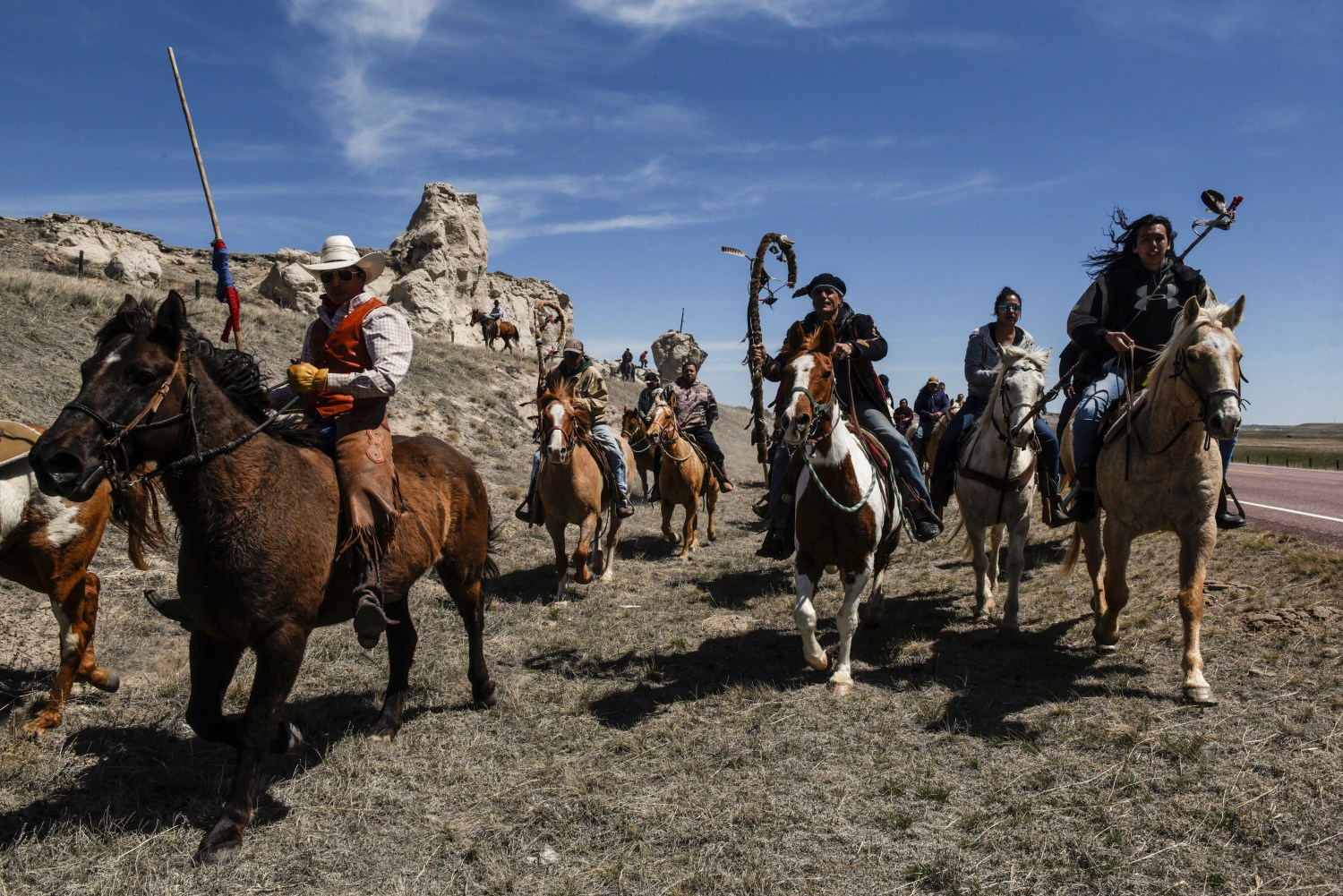 The Fort Laramie treaty riders cross the Nebraska and Wyoming border in Van Tassel, Wyoming, U.S., April 25, 2018. REUTERS/Stephanie Keith - RC1BDDE04710
