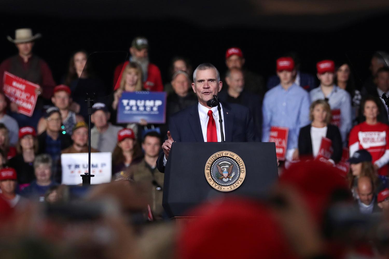 Republican candidate for U.S. Senate Matt Rosendale speaks to the crowd during U.S. President Donald Trump's rally with supporters in a hangar at Missoula International Airport in Missoula, Montana, U.S. October 18, 2018. REUTERS/Jonathan Ernst - RC13421CCCE0