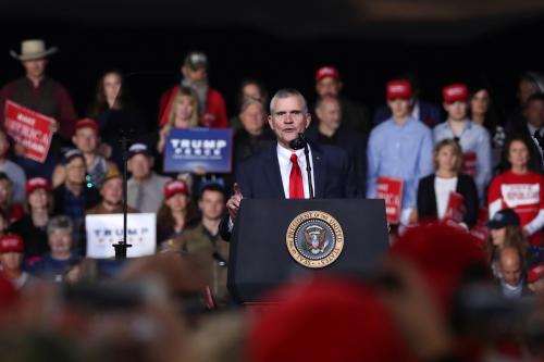 Republican candidate for U.S. Senate Matt Rosendale speaks to the crowd during U.S. President Donald Trump's rally with supporters in a hangar at Missoula International Airport in Missoula, Montana, U.S. October 18, 2018. REUTERS/Jonathan Ernst - RC13421CCCE0