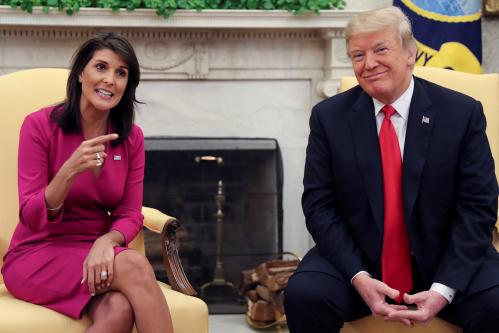 Outgoing U.S. Ambassador to the United Nations Nikki Haley talks with U.S. President Donald Trump in the Oval Office of the White House after the president accepted Haley's resignation in Washington, U.S., October 9, 2018. REUTERS/Jonathan Ernst - RC1B33F34810