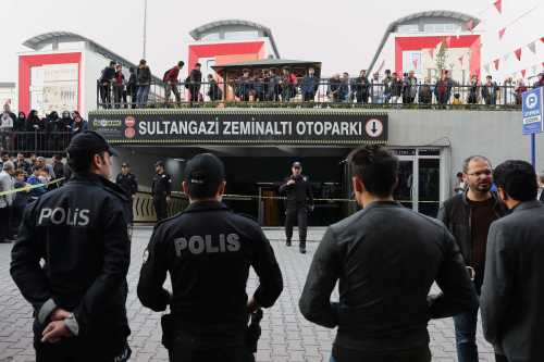 Turkish police officers stand guard at the entrance of a car park where a vehicle belonging to Saudi Arabia's consulate was found, in Istanbul, Turkey October 22, 2018. REUTERS/Huseyin Aldemir - RC117DA0E8B0