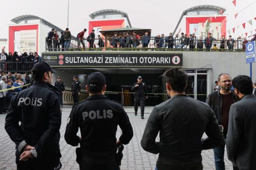 Turkish police officers stand guard at the entrance of a car park where a vehicle belonging to Saudi Arabia's consulate was found, in Istanbul, Turkey October 22, 2018. REUTERS/Huseyin Aldemir - RC117DA0E8B0