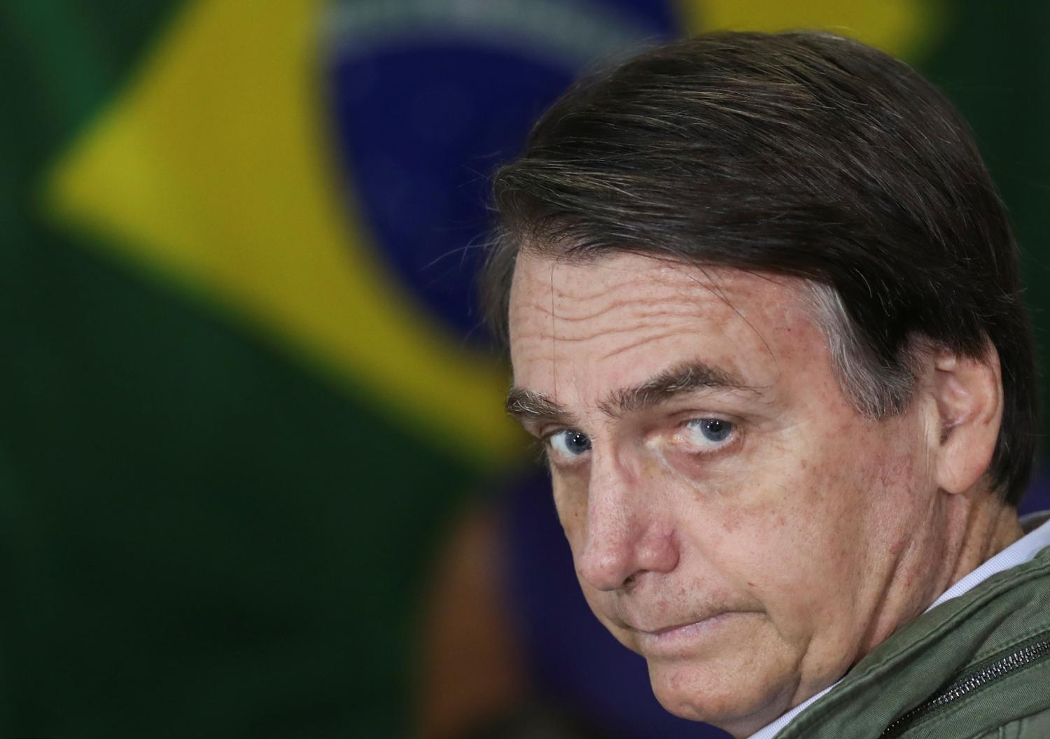 Jair Bolsonaro, far-right lawmaker and presidential candidate of the Social Liberal Party (PSL), looks on as he arrives to cast his vote, in Rio de Janeiro, Brazil October 28, 2018. REUTERS/Ricardo Moraes/Pool - RC1FE5488C00