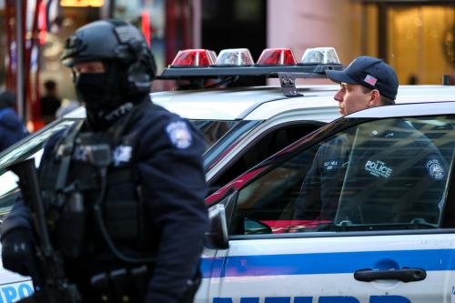 New York Police Department Counterterrorism Bureau members stand in Times Square to provide security ahead of New Year's Eve celebrations in Manhattan, New York, U.S. December 28, 2017. REUTERS/Amr Alfiky - RC1B736CC460