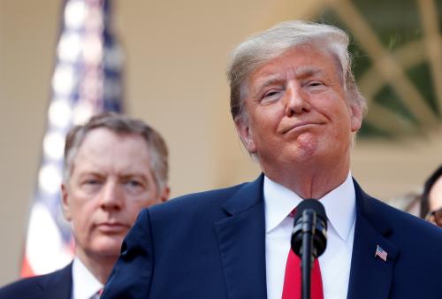 U.S. President Donald Trump stands with U.S. Trade Representative Robert Lighthizer as he delivers remarks on the United States-Mexico-Canada Agreement (USMCA) during a news conference in the Rose Garden of the White House in Washington, U.S., October 1, 2018. REUTERS/Kevin Lamarque - RC1BB77F6CD0