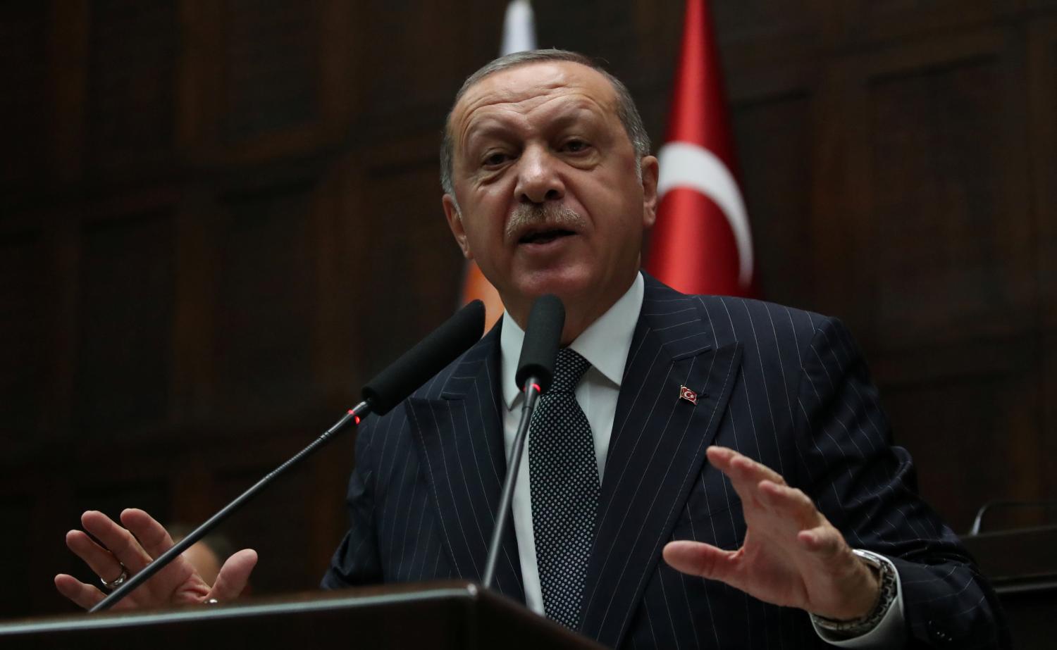 Turkish President Tayyip Erdogan addresses members of parliament from his ruling AK Party (AKP) during a meeting at the Turkish parliament in Ankara, Turkey, October 2, 2018. REUTERS/Umit Bektas - RC155976E690