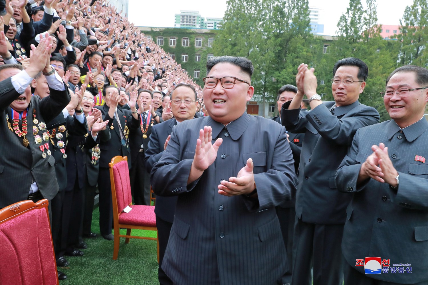 North Korean leader Kim Jong Un attends a photo session with teachers and researchers of Kim Chaek University of Technology in Pyongyang during a ceremony marking the 70th founding anniversary of the university, in this photo released by North Korea's Korean Central News Agency (KCNA) on September 29, 2018.    KCNA via REUTERS ATTENTION EDITORS - THIS IMAGE WAS PROVIDED BY A THIRD PARTY. REUTERS IS UNABLE TO INDEPENDENTLY VERIFY THIS IMAGE. NO THIRD PARTY SALES. SOUTH KOREA OUT. - RC1839E03400