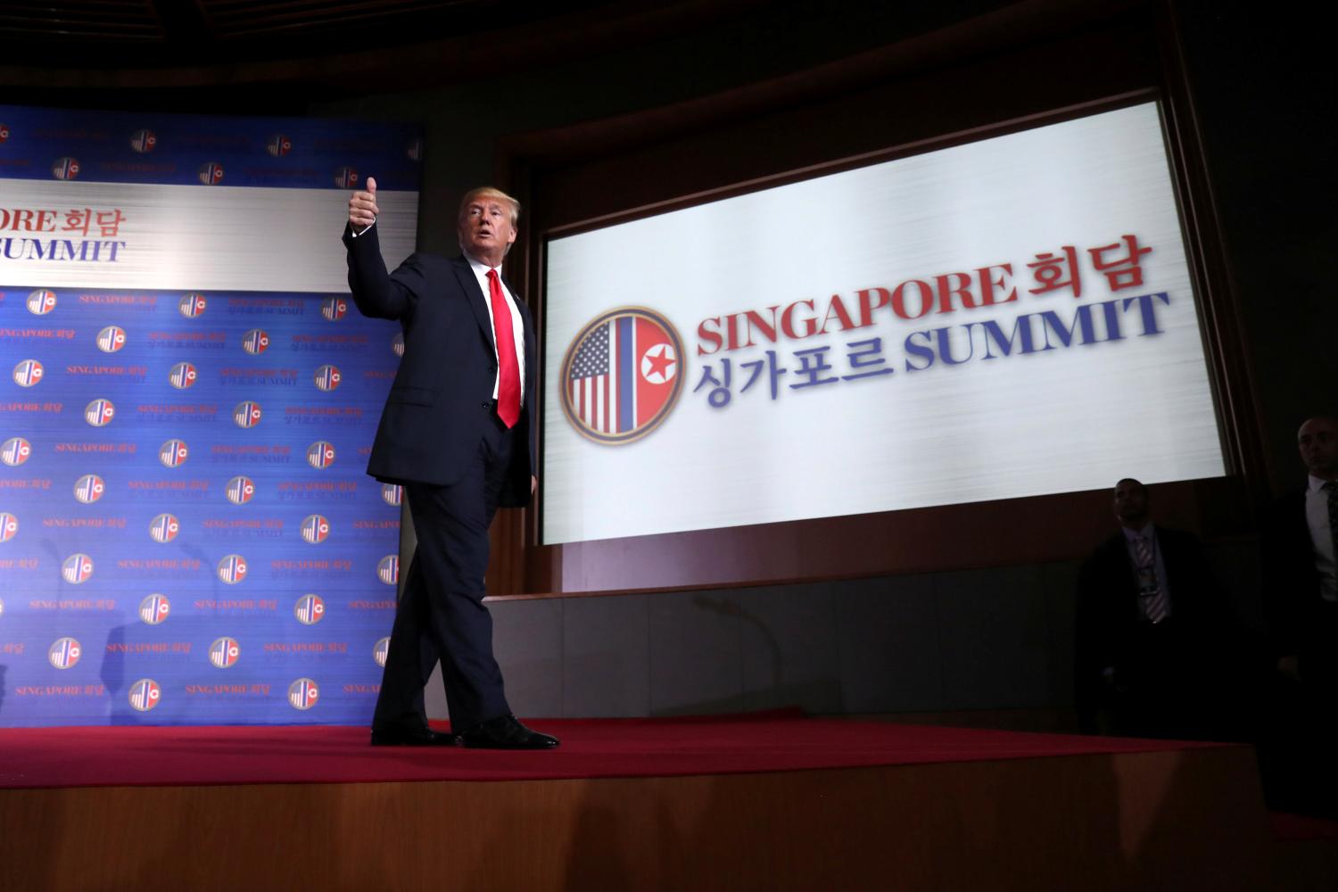 U.S. President Donald Trump gestures after a news conference after his meeting with North Korean leader Kim Jong Un at the Capella Hotel on Sentosa island in Singapore June 12, 2018. REUTERS/Jonathan Ernst     TPX IMAGES OF THE DAY - RC1F76777E70