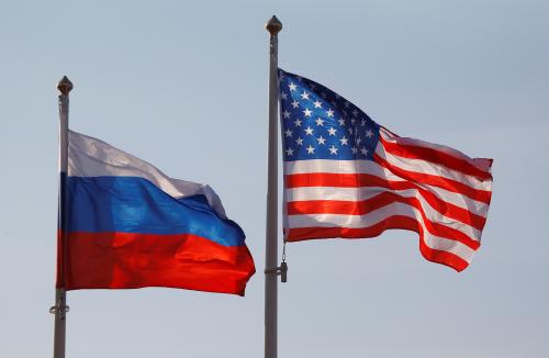 National flags of Russia and the U.S. fly at Vnukovo International Airport in Moscow, Russia April 11, 2017.  REUTERS/Maxim Shemetov - RC1B182A80F0