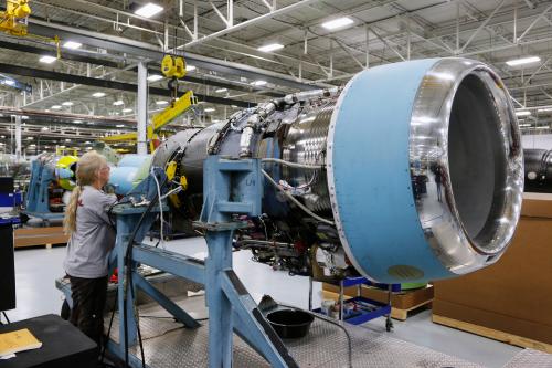 Cessna employee Lee York works on an engine of a Cessna business jet at the assembly line in their manufacturing plant in Wichita, Kansas March 12, 2013. Aviation has been a central part of Wichita's economy since the first commercially built aircraft in the United States were produced here in the 1920s. Picture taken March 12, 2013. To match Insight USA-FISCAL/JETS REUTERS/Jeff Tuttle (UNITED STATES - Tags: TRANSPORT BUSINESS POLITICS INDUSTRIAL) - GM1E93K14V801