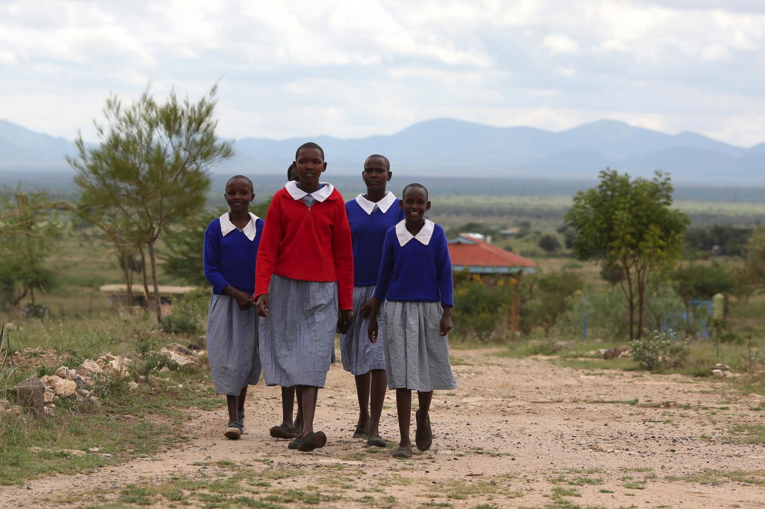 Students arrive at the start of a social event advocating against harmful practices such as Female Genital Mutilation (FGM) at the Imbirikani Girls High School in Imbirikani, Kenya, April 21, 2016. REUTERS/Siegfried Modola - GF10000390972