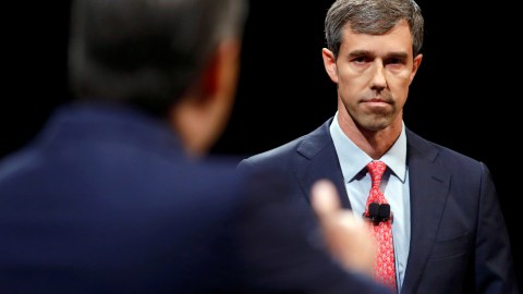 FILE PHOTO: Rep. Beto O'Rourke (D-TX) looks on as he listens to Sen. Ted Cruz (R-TX) during a debate for Texas U.S. Senate seat at the Southern Methodist University in Dallas, Texas, U.S., September 21, 2018. Tom Fox/The Dallas Morning News/Pool via REUTERS/File Photo   NO RESALES. MANDATORY CREDIT. - RC182E321AB0