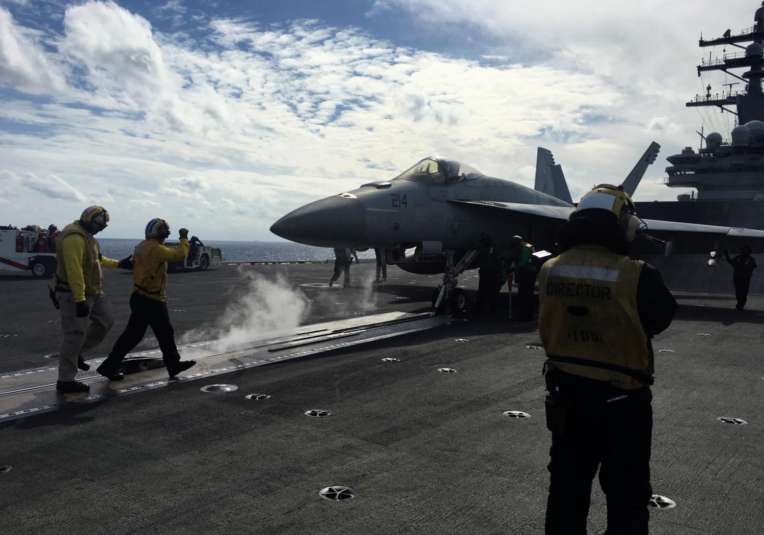 U.S. Navy aircraft carrier USS Ronald Reagan conducts military drills during Keen Sword, a joint field-training exercise involving U.S. military, Japan Maritime Self-Defense Force personnel and Royal Canadian Navy, at sea November 3, 2018. REUTERS/Tim Kelly - RC181BE22600