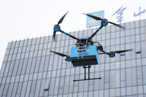 A drone is seen during a demonstration for the media before a news conference by Chinese food delivery company Ele.me on its drone delivery service, in Shanghai, China May 29, 2018. REUTERS/Aly Song - RC1F52D05060