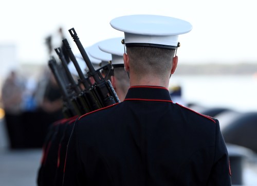 U.S. Marines prepare for the "Rifle Salute" during the ceremonies honoring the 75th anniversary of the attack on Pearl Harbor at Kilo Pier on Joint Base Pearl Harbor - Hickam in Honolulu, Hawaii December 7, 2016. REUTERS/Hugh Gentry - RC197CC0F250