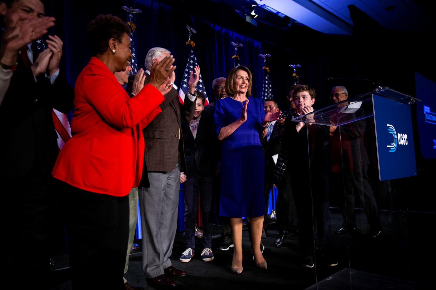 U.S. House Minority Leader Nancy Pelosi reacts alongside fellow House Democrats to the results of the U.S. midterm elections at a Democratic election night rally in Washington, U.S. November 6, 2018. REUTERS/Al Drago - RC12CAFEB860
