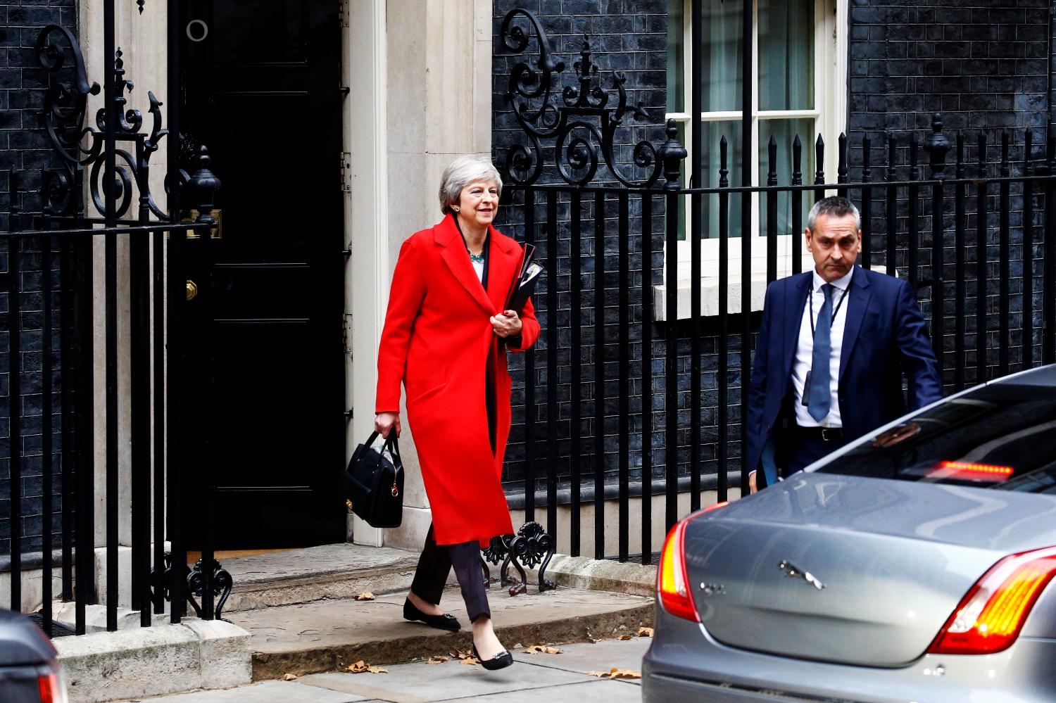 Britain's Prime Minister, Theresa May, leaves 10 Downing Street, to make a statement in the House of Commons, in London, Britain November 15, 2018.    REUTERS/Peter Nicholls - RC1620B3D870