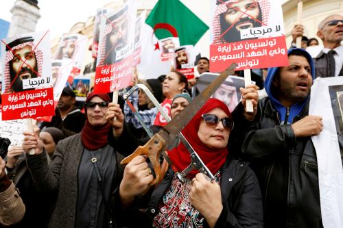 A woman takes part in a protest, opposing the visit of Saudi Arabia's Crown Prince Mohammed bin Salman in Tunis, Tunisia, November 27, 2018. REUTERS/Zoubeir Souissi     TPX IMAGES OF THE DAY - RC189BD0FD50