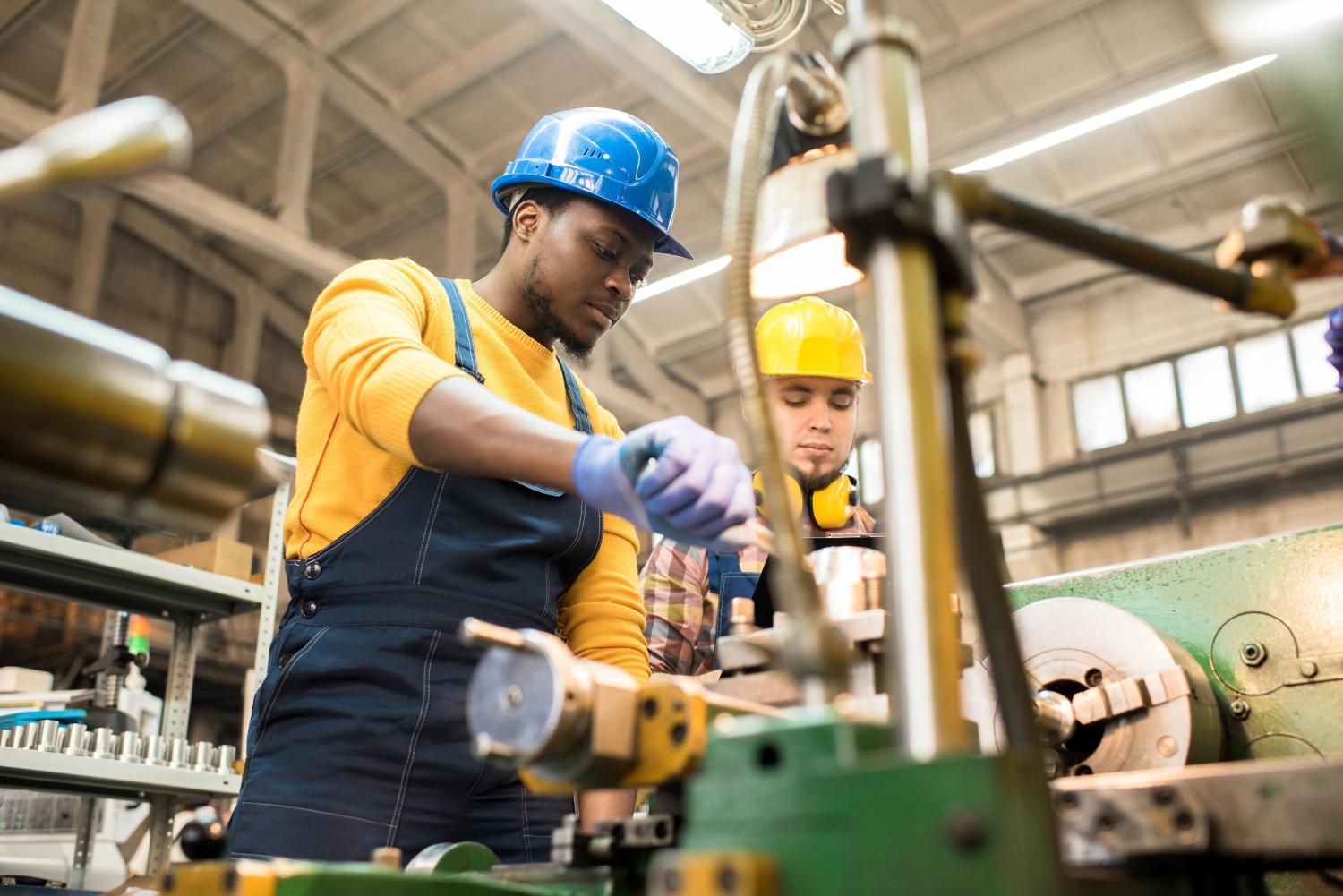 Employees at manufacturing plant