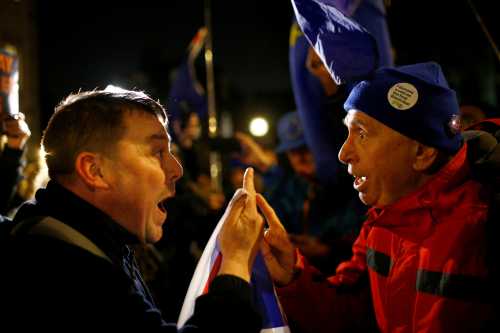 Pro-Brexit and anti-Brexit demonstrators shout at each other opposite the Houses of Parliament, in Westminster, central London, Britain December 11, 2018. REUTERS/Henry Nicholls     TPX IMAGES OF THE DAY - RC17FE78FFF0