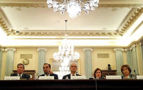 Federal Trade Chairman Joseph Simons, (L), Federal Trade Commissioners (2nd L-R), Rohit Chopra, Noah Phillips, Rebecca Slaughter and Christine Wilson testify on the "Oversight of the Federal Trade Commission" before the U.S. Senate Consumer Protection, Product Safety, Insurance and Data Security Subcommittee in the Russell Senate Office Building in Washington, U.S., November 27, 2018. REUTERS/ Leah Millis - RC1654D52A80