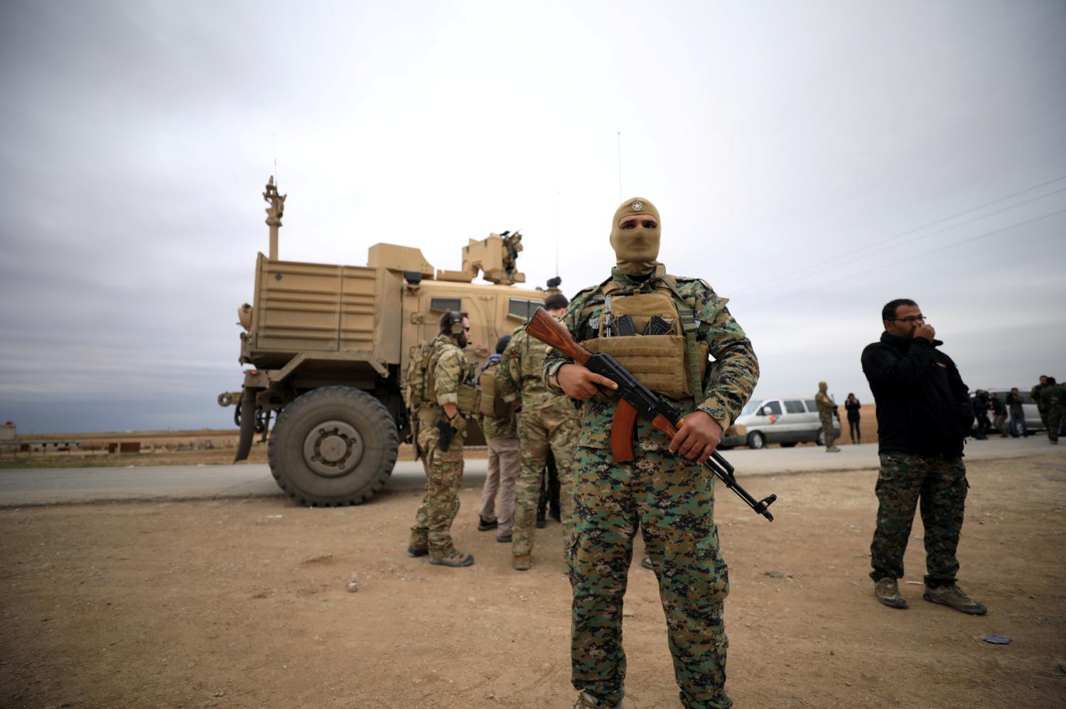 Syrian Democratic Forces and U.S. troops are seen during a patrol near Turkish border in Hasakah, Syria November 4, 2018. REUTERS/Rodi Said - RC1A340091B0