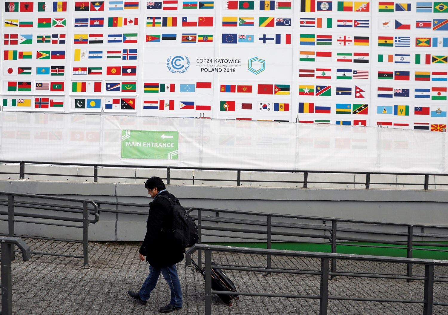A delegate arrives for the COP24 UN Climate Change Conference 2018 in Katowice, Poland December 2, 2018. REUTERS/Kacper Pempel