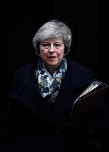Britain's Prime Minister Theresa May leaves 10 Downing Steet in London, Britain, December 17, 2018. REUTERS/Toby Melville - RC19399CB420