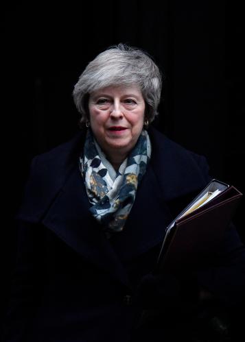 Britain's Prime Minister Theresa May leaves 10 Downing Steet in London, Britain, December 17, 2018. REUTERS/Toby Melville - RC19399CB420